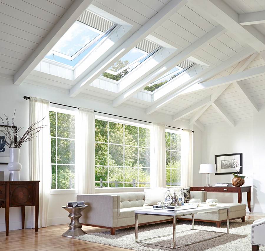 A Living Room with Three Venting Skylights That Allow Light to Pour Inside