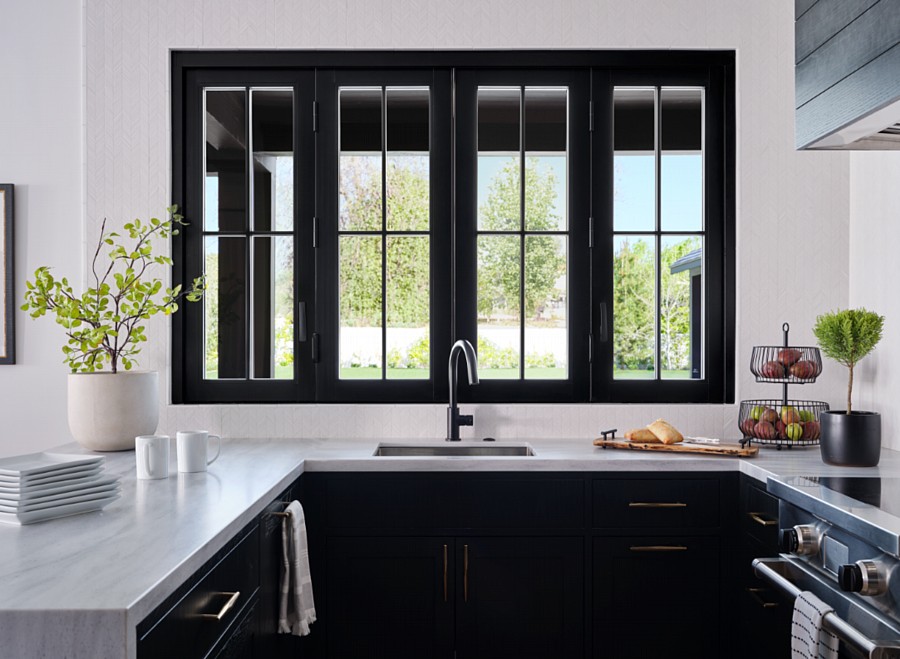 A Kitchen with Beautiful Wood Bi-Folding Windows That Open Clear Across