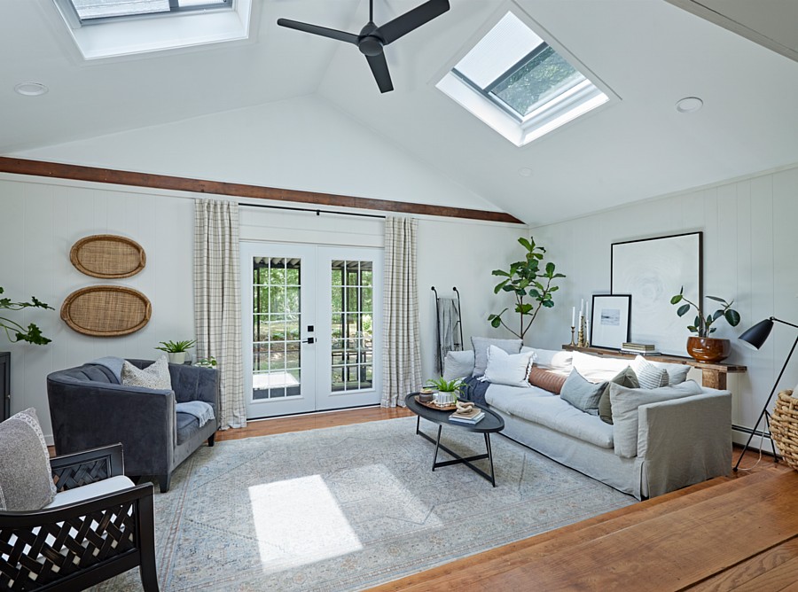 A Living Room with Skylights Above, with Light-Filtering Shades That Soften Harsh Light