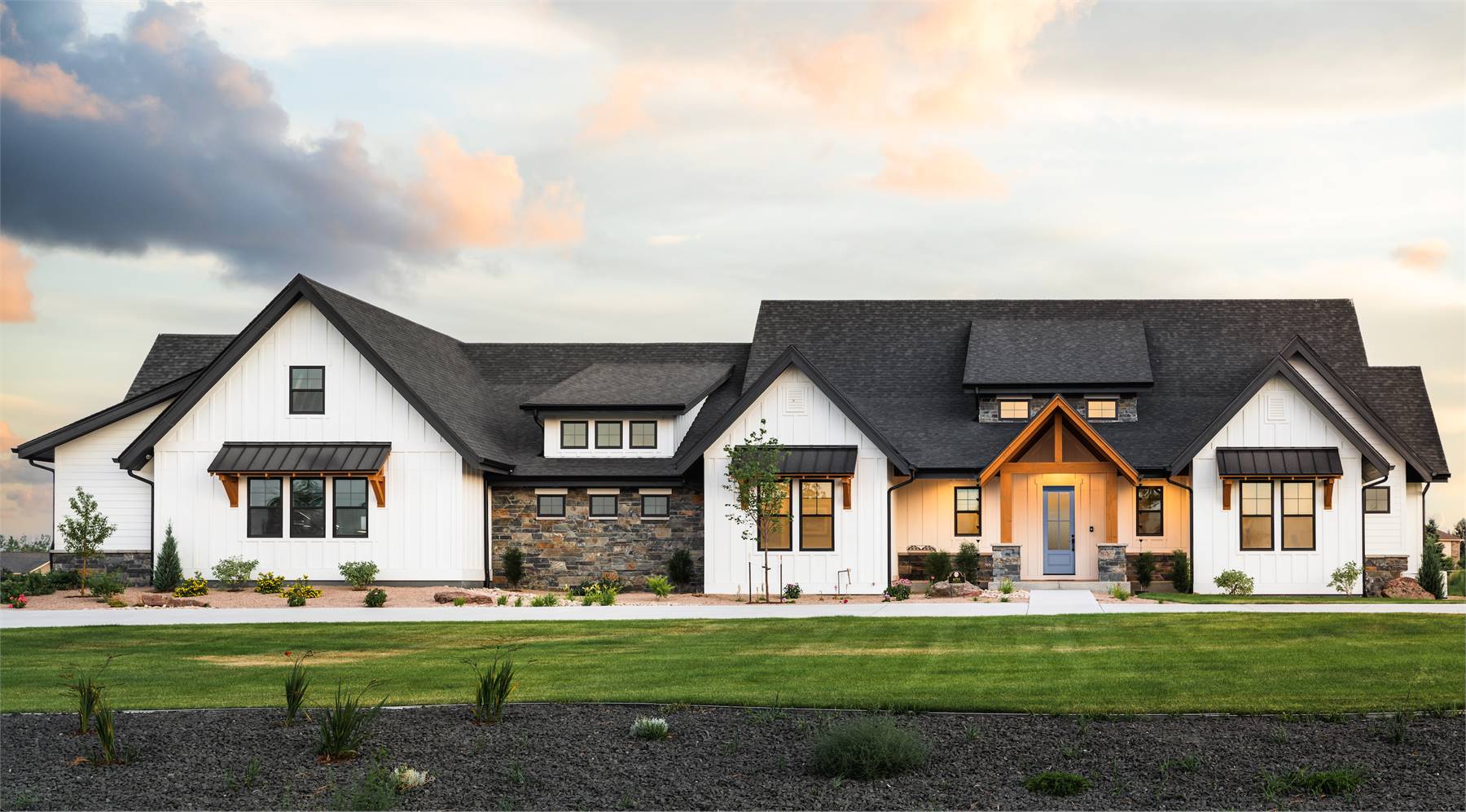 Exceptional 1 Story Farmhouse with Stone and Wood Facade