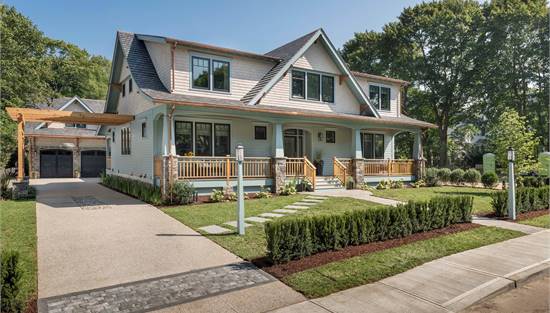 Porch with Tapered Columns Perched on Stone Piers